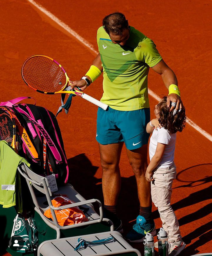 Photos Of The Most Remarkable Moment In 2022 When A Young Fan Ran Into The Court And Greeted Rafael Nadal At Rolland Garros [PHOTOS].